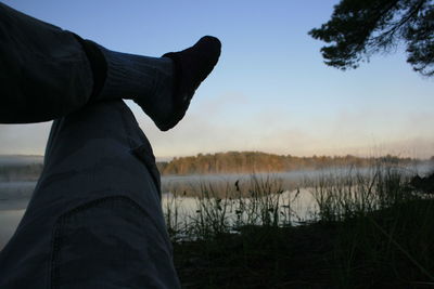 Low section of man in lake