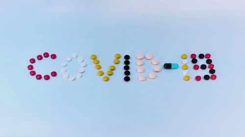 High angle view of multi colored pencils against white background