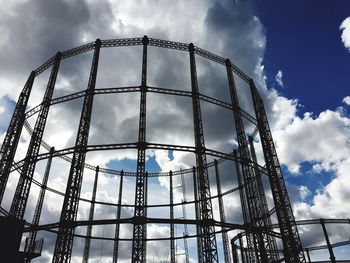 Low angle view of metallic structure at gasworks gallery against sky