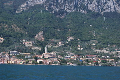 Aerial view of townscape by sea