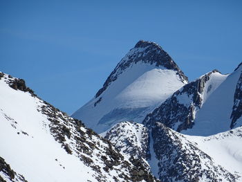 Snow covered mountain against sky