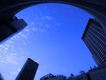 Low angle view of building against blue sky