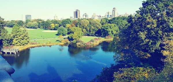 Scenic view of calm lake against clear sky