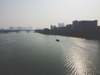 View of river with buildings in background