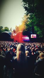 Rear view of people watching music concert