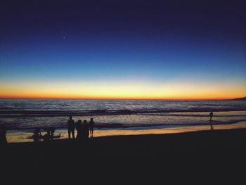 Scenic view of sea at sunset