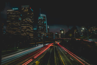 High angle view of light trails on road at night