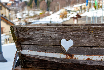 Close-up of heart shape on snow