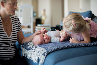 Mother with children at home