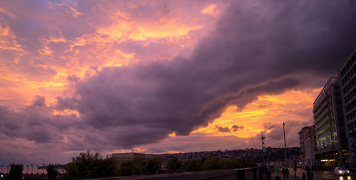 Storm clouds over dramatic sky during sunset