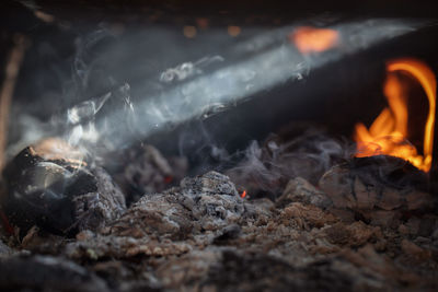 Close-up of bonfire on barbecue grill