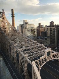 High angle view of buildings in city against sky