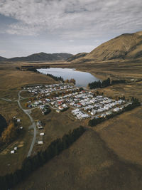 Lake clearwater village with the southern alps in the background. nz