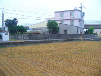 Houses in town against clear sky