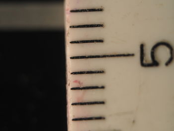 Close-up of number on ruler