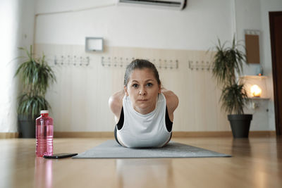 Group of women practicing pilates exercises in class