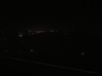 Aerial view of moon in sky at night