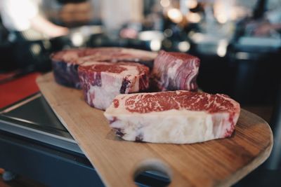 Close-up of meat on cutting board