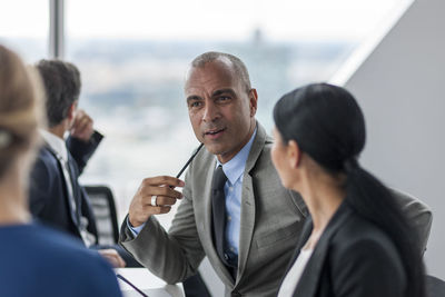 Businessman and businesswomen at meeting