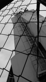 Low angle view of branches against sky