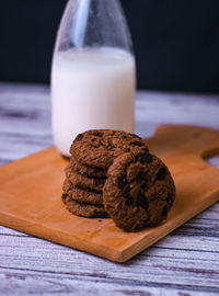 Milk and chocolate chips cookies in the mid-day 