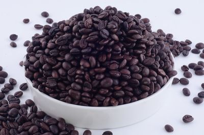 Close-up of coffee beans on table