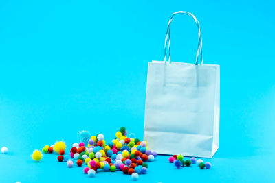 Close-up of candies against blue background