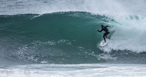 Man surfing in sea