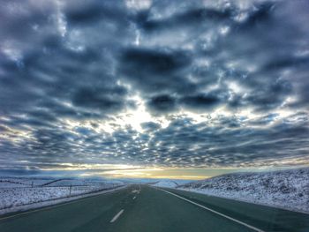 Road against dramatic sky