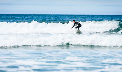 Man surfing in sea