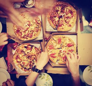 Low section of woman eating food