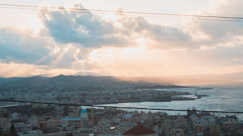 High angle view of cityscape against sky during sunset