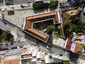 High angle view of street amidst buildings in city