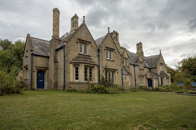 House on field against sky