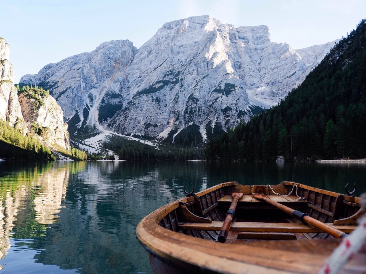 BOATS MOORED ON RIVER