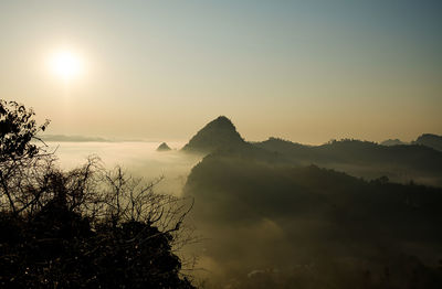 Scenic view of mountains against sky during sunset
