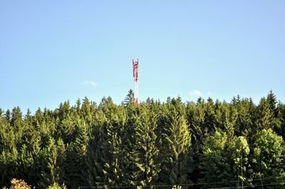 Low angle view of tower against clear blue sky