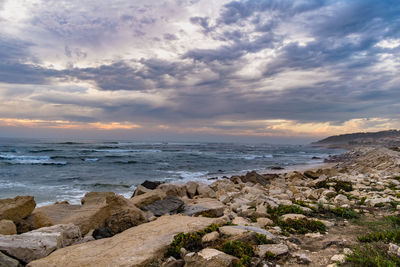 Scenic view of sea against sky during sunset