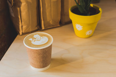 Close-up of coffee cup on table