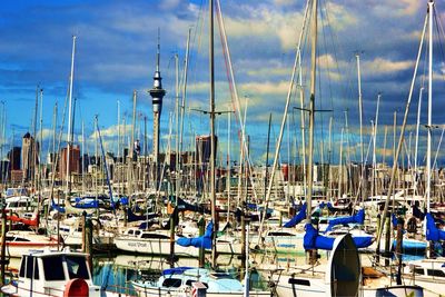 Boats moored at harbor