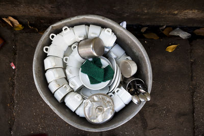 High angle view of cups in container