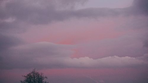 Low angle view of dramatic sky during sunset