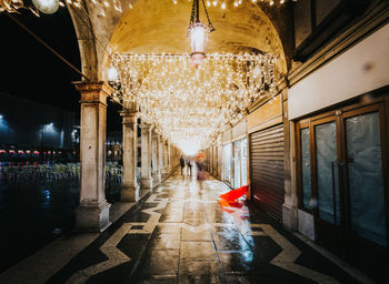 Illuminated corridor of building