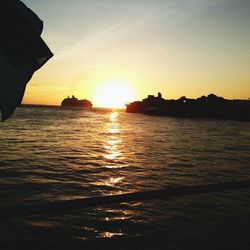 Scenic view of sea at sunset