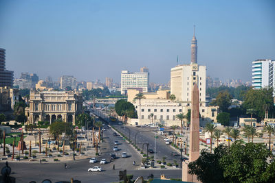 Buildings in city against sky