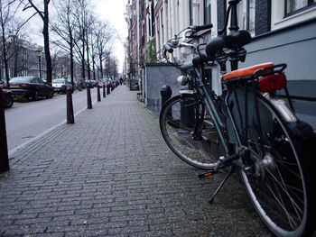 Bicycle parked on road