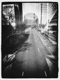 Road along buildings in city