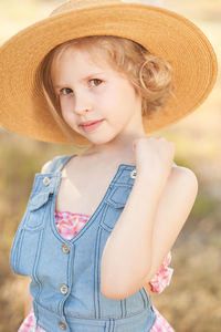 Girl wearing hat outdoors
