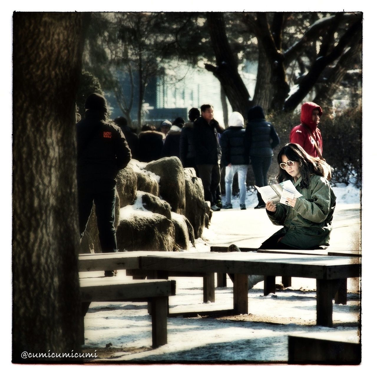 transfer print, men, auto post production filter, lifestyles, person, leisure activity, medium group of people, season, rear view, winter, sitting, tree, large group of people, cold temperature, togetherness, standing, water, snow