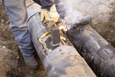 Low section of manual worker welding